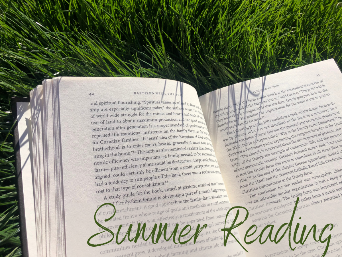 book in grass with the text summer reading overlaid